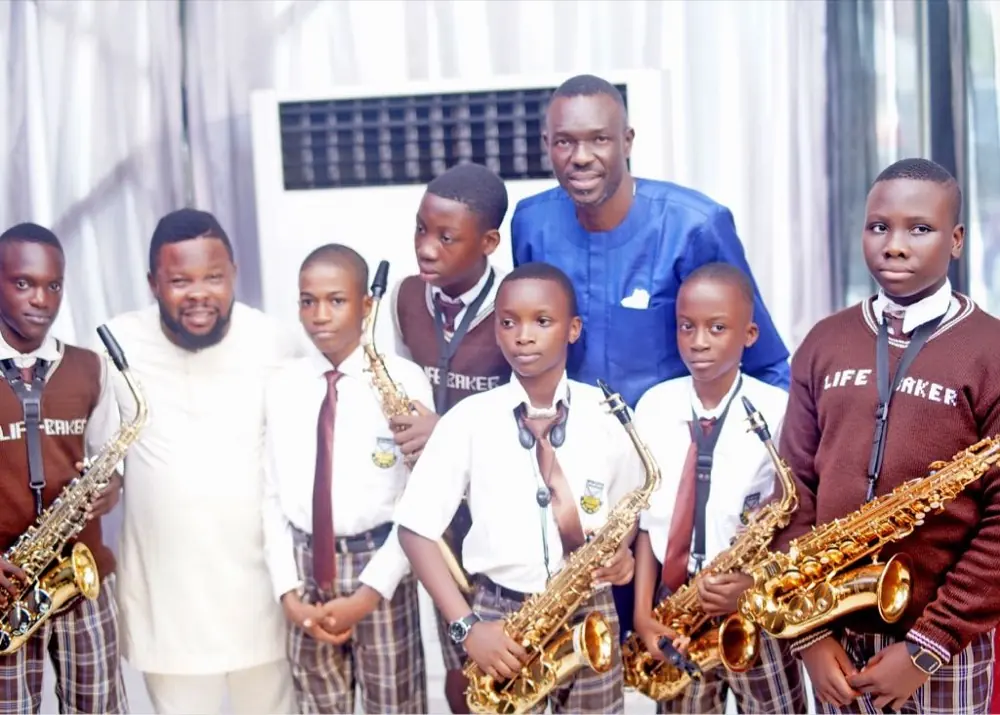 The school band with their instructors after a performance