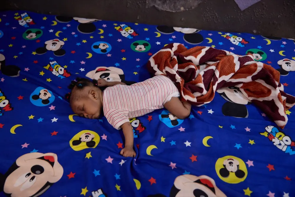 A child resting in the daycare room