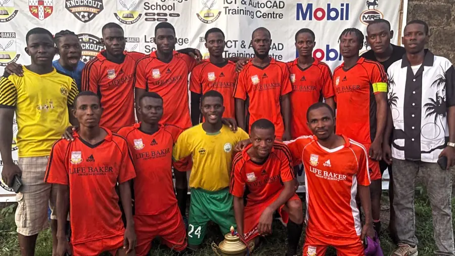 A tournament squad with the trophy