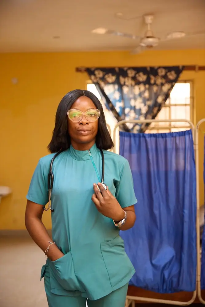 A nurse attending to a student in the medical centre